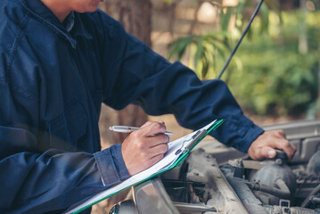 Mechanic car service auto garage in automotive mobile center. Technician workshop repair engine...