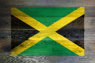 Jamaica flag on rustic old wood surface background