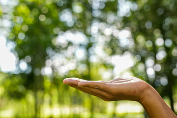 Technology, hand holding with environment Icons over the Network connection on green background.