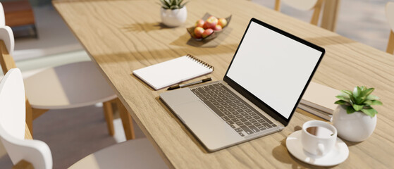 Comfortable co-working space with a portable laptop mockup on wood long table.