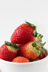 Ripe strawberry in a bowl.