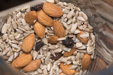 overhead shot of a glass bowl with vegan seeds prepared for a healthy meal