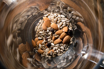 overhead shot of a glass bowl with vegan seeds prepared for a healthy meal