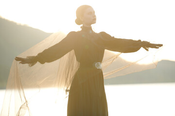 sad lady on sea coast