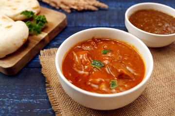 Indian chicken curry roux like tomato soup on the table