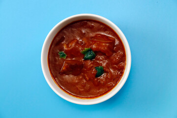 Indian chicken curry roux like tomato soup on the table