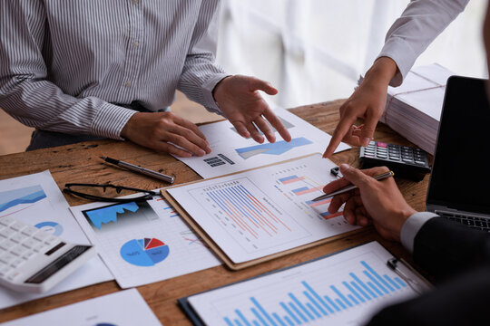 Team Of Business working at office with documents on his desk, doing planning analyzing the financial report, business plan investment, finance analysis concept