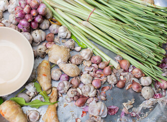 Ginger, galangal, lemongrass, garlic, onion, kaffir lime leaves, spices and ingredients in hot or spicy tom yum dishes. Asian food or Thailand such as tom yum goong