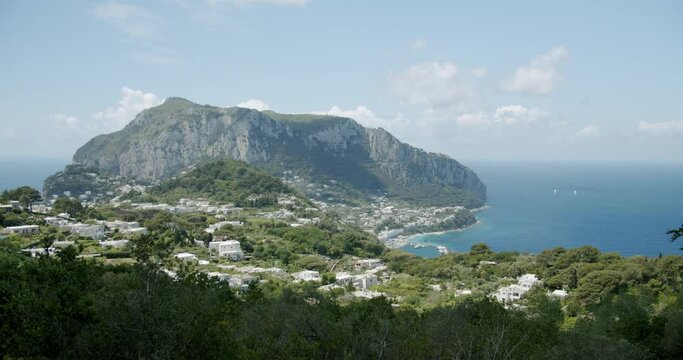Beautiful view of Capri and Monte Solaro form Villa Jovis during a sunny day in Summer