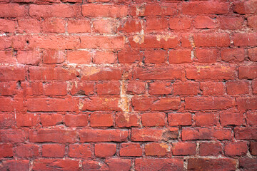 Empty brick red wall. background of a old brick house.