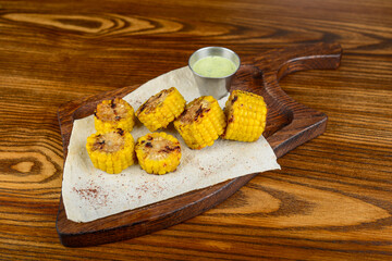 grilled corn on pita bread with sauce