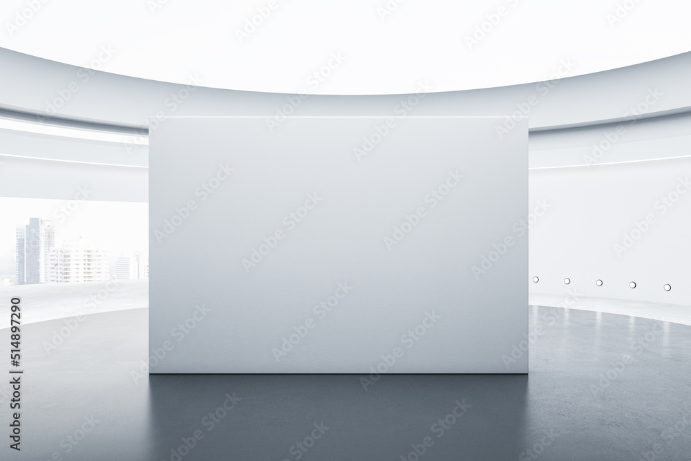 Aufkleber Front view on blank on light grey partition with place for your logo or text on concrete floor in empty sunlit round gallery hall with city view. 3D rendering, mock up