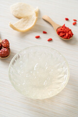 Edible bird's nest soup in glass bowl