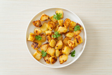 Roasted or grilled potatoes  on plate