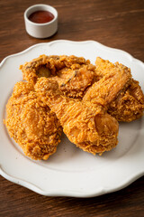 fried chicken with ketchup on plate