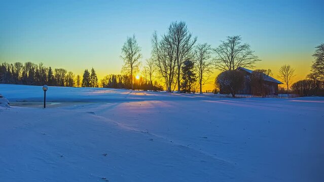 Dynamic shades of sun setting melting snow timelapse