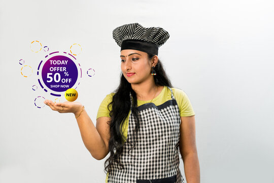 Chef woman holding a discount sale tags