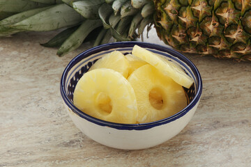 Marinated pineapple rings in the bowl