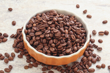 Fototapeta premium Roasted coffee bean in the bowl