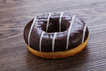 Glazed sweet tasty chocolate donut