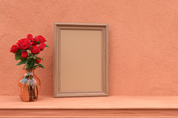Picture frame mock up on terra cotta shelf. 3d rendered illustration.