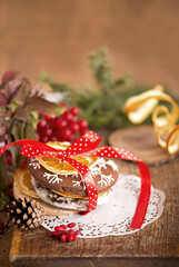 Obraz na płótnie Canvas Christmas decoration with cookies on an old wooden background.