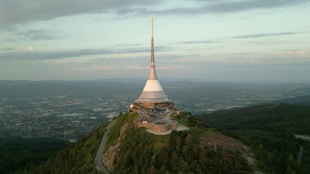 Jested Tower, Hotel, Restaurand and TV Tower in Liberec Czech Republic lit with sunset