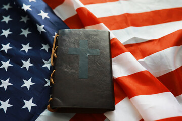 Book with the symbol of the cross. Bible study. Religious book. Prayer.