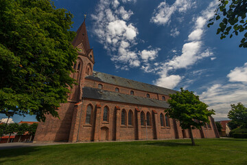 03-07-2022 Assens, Denmark - City Church with blue sky, on a summer day