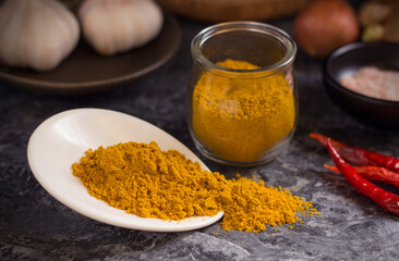 Heap of curry powder indian kitchen
