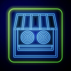 Glowing neon Shooting gallery icon isolated on blue background. Shooting range. Vector