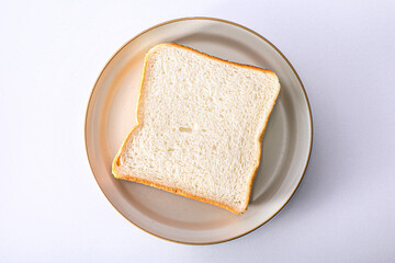 Fototapeta na wymiar 皿にのった食パン