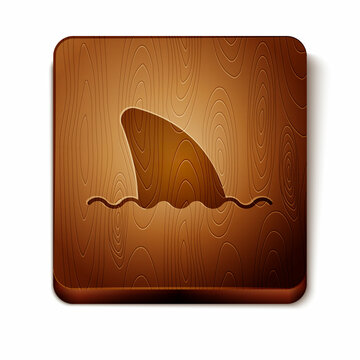 Brown Shark fin in ocean wave icon isolated on white background. Wooden square button. Vector