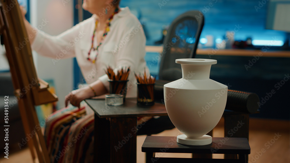 Poster authentic vase model on table with pencils and artistic tools to create professional sketch drawing 