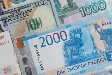 Fototapeta na wymiar Money from different countries: dollars, euros, rubles. International currencies background.