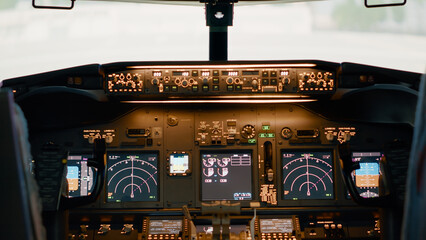 No people in empty airplane cockpit with power buttons and engine lever to throttle at takeoff....