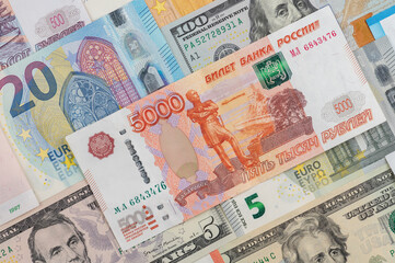 Money from different countries: dollars, euros, rubles. International currencies background.