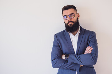 Portrait of pensive businessman. Copy space on image for your text or advert.