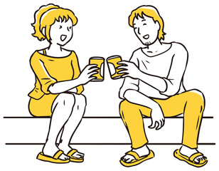 缶ビールで乾杯する男女