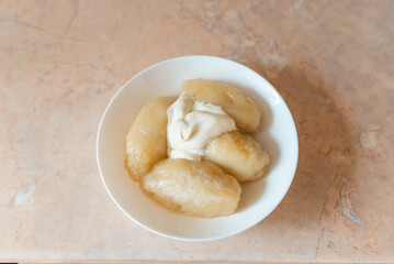 Traditional Lithuanian dish meal cuisine, stuffed meat potato dumpling,most popular Lithuanian national dish on a plate.