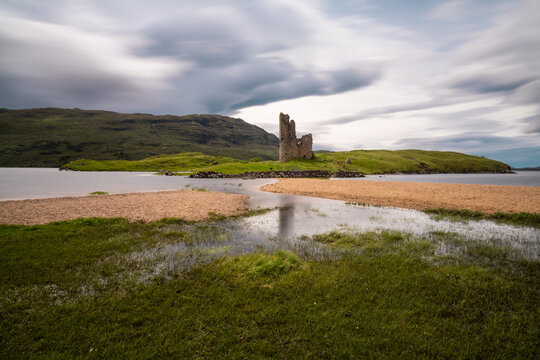 long exposure view of the Ardvreck Castle on Loch Assynt in the Scottish Highlands