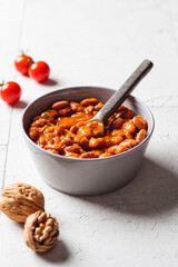 Lobio - dish of Georgian cuisine. Red bean stew with tomato sauce, nuts and herbs.