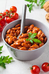 Lobio - dish of Georgian cuisine. Red bean stew with tomato sauce, nuts and herbs.