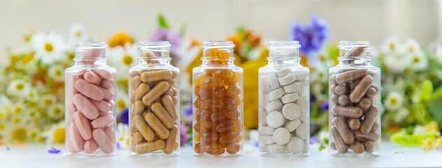 Homeopathy and dietary supplements from medicinal herbs. Selective focus.