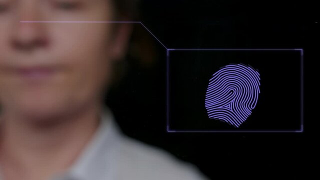 Biometric identification of person of scanning  fingerprint. Man finger scanned by access control reader, fingerprint pattern scan with biometric data, graphical interface.