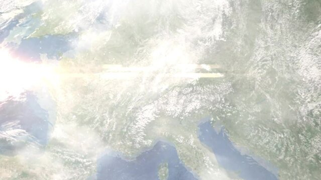 Earth zoom in from outer space to city. Zooming on Frauenfeld, Switzerland. The animation continues by zoom out through clouds and atmosphere into space. Images from NASA