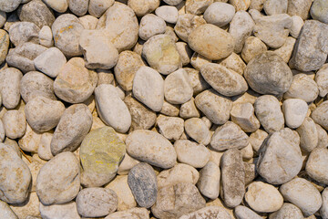 海岸沿いの小石の背景素材