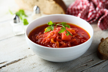 Traditional homemade beetroot soup with fresh parsley