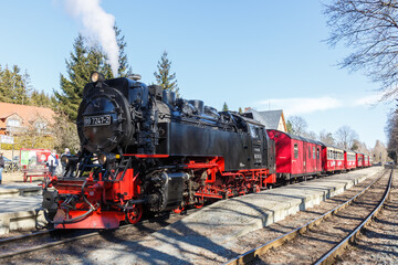 Fototapeta na wymiar Brockenbahn Steam train locomotive railways at Drei Annen Hohne railway station in Germany