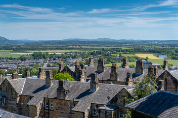 view of rooftops and stone chimneys of typical rowhouses in the old city center of Stirling